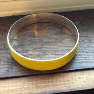 Yellow metal bangle